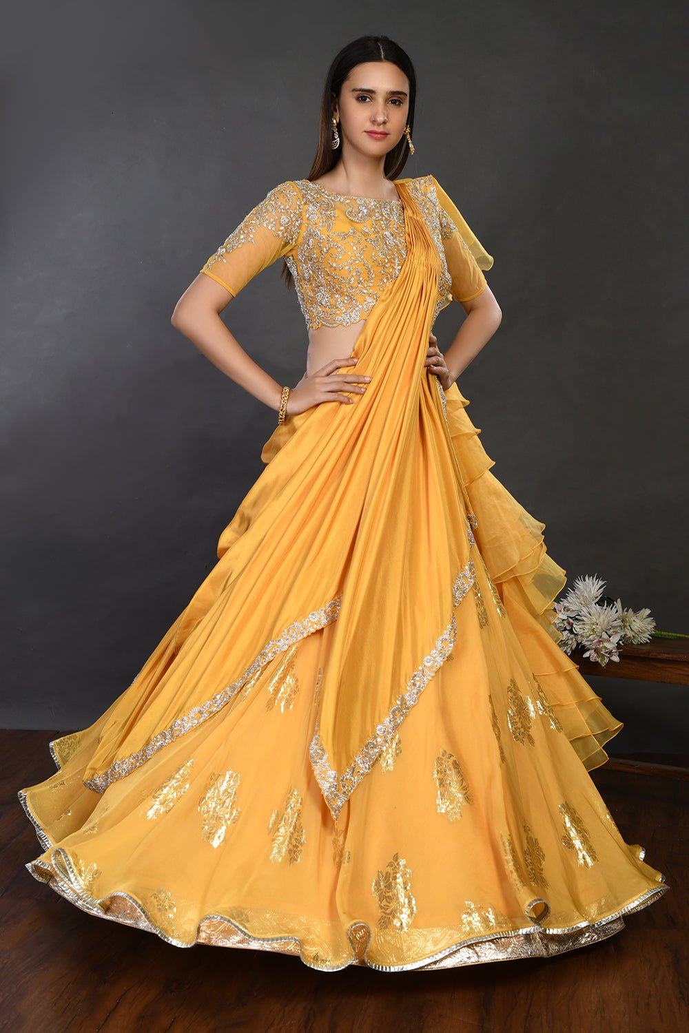 Buy gorgeous yellow embroidered designer lehenga online in USA with dupatta. Dazzle on weddings and special occasions with exquisite Indian designer dresses, sharara suits, Anarkali suits, wedding lehengas from Pure Elegance Indian fashion store in USA.-full view