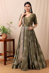 Shop this beautiful kai green embroidered anarkali set with mirror work from Pure Elegance featuring intricate embroidery and a V-neck. Made with premium quality chanderi silk fabric, this set contains a anarkali suit, a dupatta with zari work, and a belt. Pair it up with statement jewellery to complete your look from Pure Elegance Indian clothing store in USA online now.-Full view.