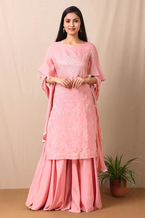 Shop beautiful set of set of Pink Upadda Silk with Satin Organza Sharara and Tabby Dupatta and Tonal Sequins Motifs, lace around the neckline with beautiful tassels on it from Pure Elegance. Light up your ethnic collection of clothing with this kurta and sharara from Pure elegance. It's woven from a fabric that's airy and uber soft against your skin. Pair it up with statement jewellery to complete your look from Pure Elegance Indian clothing store in USA online now.-Full view.