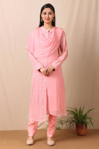 Shop beautiful set of set of  pink georgette embroidered kurta with cotton stretch pants and tabby scarf from Pure Elegance. Complete the look by wearing statement jewellery and heels. Light up your ethnic collection of clothing with this kurta and embelished with light rose gold sequin embroidery. It's woven from a fabric that's airy and uber soft against your skin. Pair it up with statement jewellery to complete your look from Pure Elegance Indian clothing store in USA online now.-Full view.