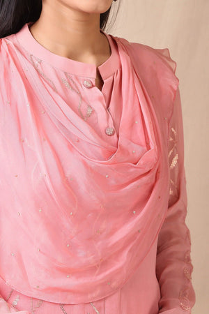 Shop beautiful set of set of  pink georgette embroidered kurta with cotton stretch pants and tabby scarf from Pure Elegance. Complete the look by wearing statement jewellery and heels. Light up your ethnic collection of clothing with this kurta and embelished with light rose gold sequin embroidery. It's woven from a fabric that's airy and uber soft against your skin. Pair it up with statement jewellery to complete your look from Pure Elegance Indian clothing store in USA online now.-Neck view.