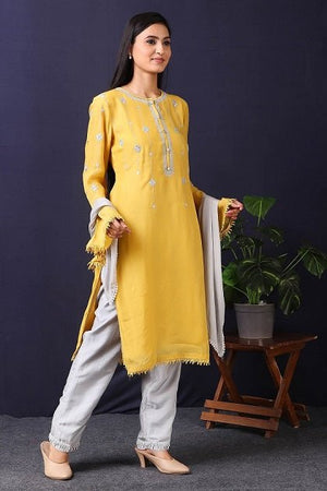 Shop this mustard-grey satin organza pakistani kurta with crepe pant and stole with mirror work with lace edging all over. This beautiful satin organza material outfit showcases beautiful sleeves with lace work on it. Style this set of kurta with a pair of diamond earrings and solid pumps to finish the look from Pure Elegance Indian fashion store in USA online now.-Side view.