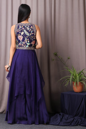 Shop this designer indo western drape and sharara in navy blue colour. This dress comes in organza and satin fabric. The borders of the saree have an exquisite design that is eye-catchy and has multicolour thread embroidery with cutdana work on it. Complete the look with a moti necklace and pair of heels. Shop this designer from Pure Elegance. Shop this designer from Pure Elegance Online Indian store now.-Back view.
