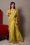 Shop this designer yellowish mehendi green drape saree in satin organza and georgette fabric With Jaal ThreadWork. This saree comes in satin and organza fabric. The borders of the saree has sequin work on it. Complete the look with embroidered blouse showcasing floral and animal motifs especially around the neckline and on the backside. Shop this designer from Pure Elegance Indian clothing store in USA online now.-Full view.