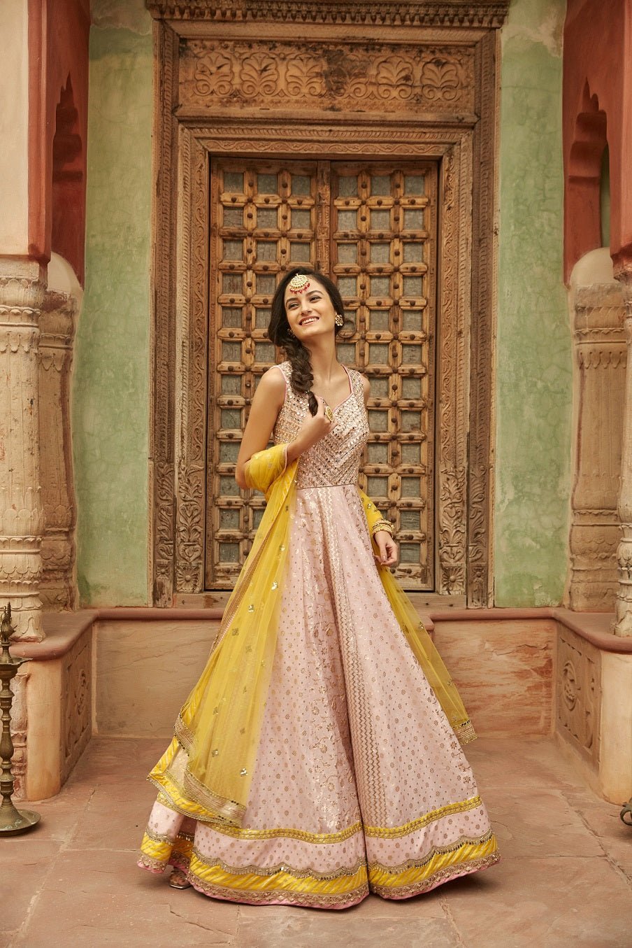 Buy stunning powder pink embroidered Banarasi Anarkali suit online in USA. Dazzle on weddings and special occasions with exquisite Indian designer dresses, sharara suits, Anarkali suits, wedding lehengas from Pure Elegance Indian fashion store in USA.-side