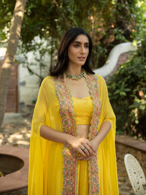 Shop stunning canary yellow palazzo crop top online in USA with multi thread cape. Dazzle on weddings and special occasions with exquisite Indian designer dresses, sharara suits, Anarkali suits, wedding lehengas from Pure Elegance Indian fashion store in USA.-closeup