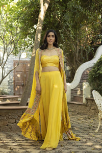 Shop stunning canary yellow palazzo crop top online in USA with multi thread cape. Dazzle on weddings and special occasions with exquisite Indian designer dresses, sharara suits, Anarkali suits, wedding lehengas from Pure Elegance Indian fashion store in USA.-full view