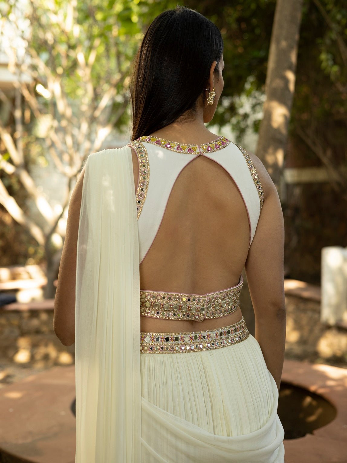 Shop beautiful pearl white embroidered draped pant saree online in USA. Dazzle on weddings and special occasions with exquisite Indian designer dresses, sharara suits, Anarkali suits, wedding lehengas from Pure Elegance Indian fashion store in USA.-back