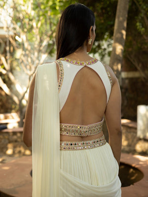 Shop beautiful pearl white embroidered draped pant saree online in USA. Dazzle on weddings and special occasions with exquisite Indian designer dresses, sharara suits, Anarkali suits, wedding lehengas from Pure Elegance Indian fashion store in USA.-back