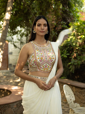 Shop beautiful pearl white embroidered draped pant saree online in USA. Dazzle on weddings and special occasions with exquisite Indian designer dresses, sharara suits, Anarkali suits, wedding lehengas from Pure Elegance Indian fashion store in USA.-closeup