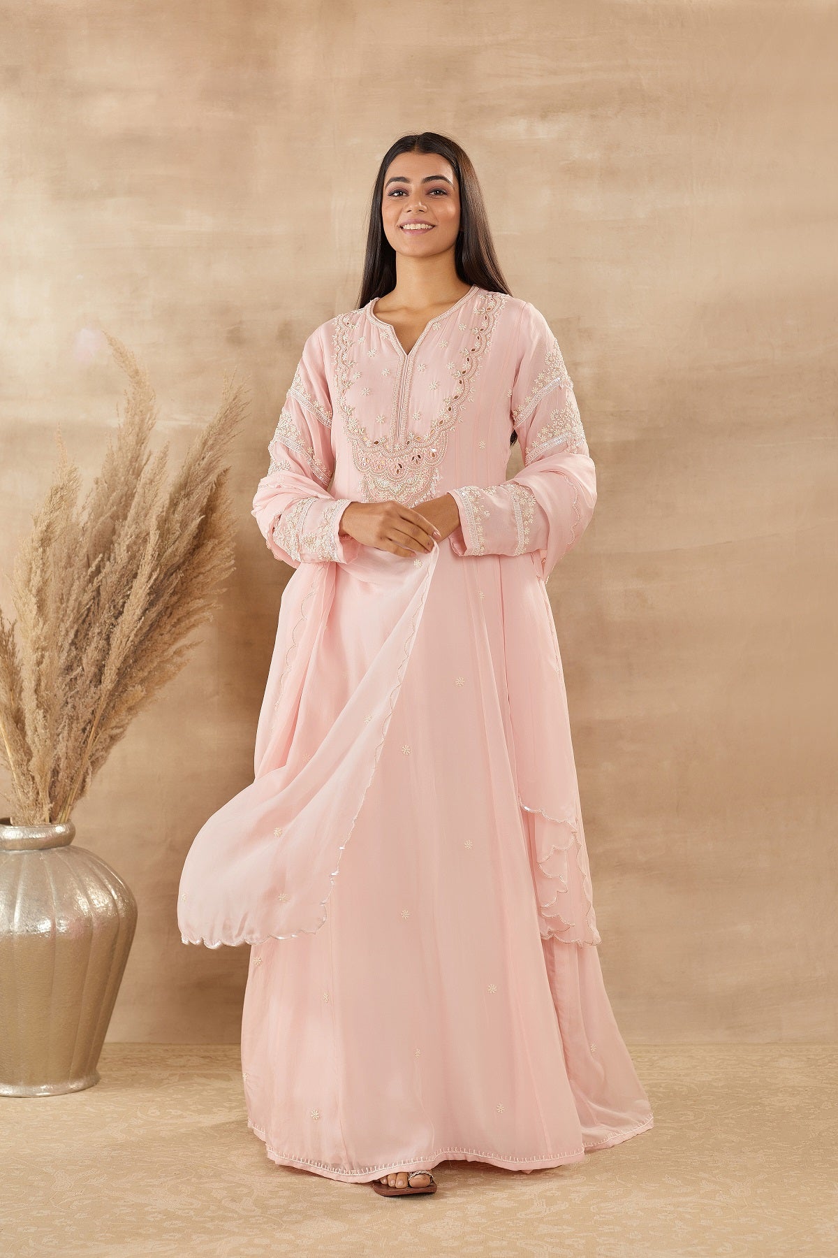Shop beautiful powder pink organza Anarkali suit online in USA with dupatta. Dazzle on weddings and special occasions with exquisite Indian designer dresses, sharara suits, Anarkali suits, wedding lehengas from Pure Elegance Indian fashion store in USA..-full view