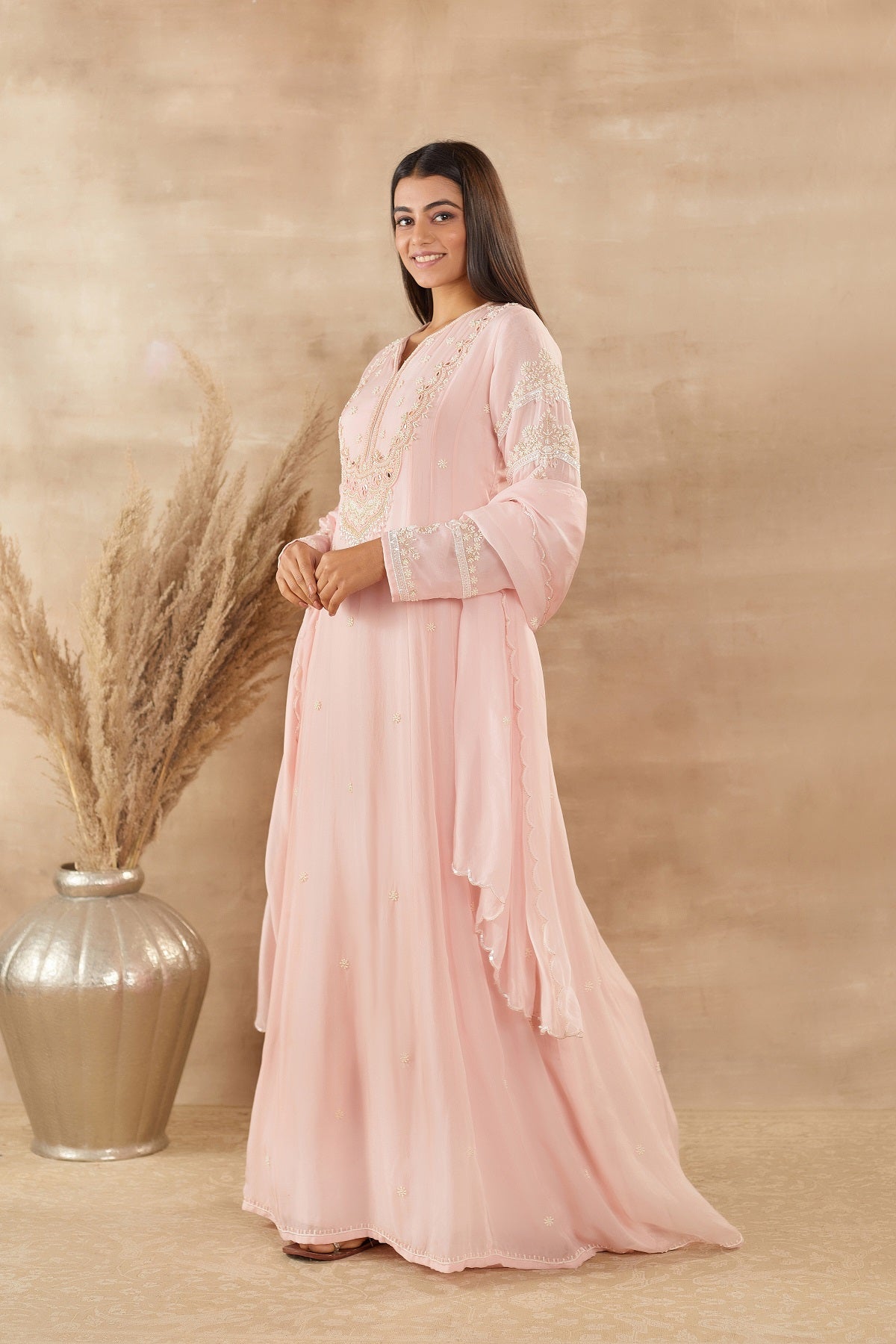 Shop beautiful powder pink organza Anarkali suit online in USA with dupatta. Dazzle on weddings and special occasions with exquisite Indian designer dresses, sharara suits, Anarkali suits, wedding lehengas from Pure Elegance Indian fashion store in USA.-side