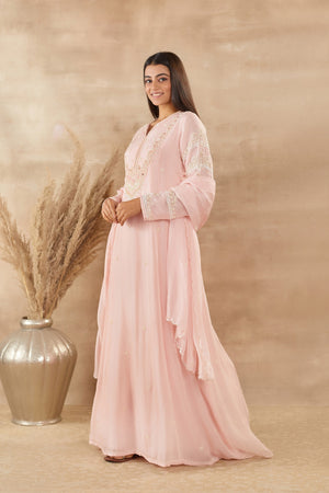 Shop beautiful powder pink organza Anarkali suit online in USA with dupatta. Dazzle on weddings and special occasions with exquisite Indian designer dresses, sharara suits, Anarkali suits, wedding lehengas from Pure Elegance Indian fashion store in USA.-side