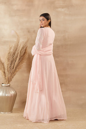 Shop beautiful powder pink organza Anarkali suit online in USA with dupatta. Dazzle on weddings and special occasions with exquisite Indian designer dresses, sharara suits, Anarkali suits, wedding lehengas from Pure Elegance Indian fashion store in USA.-back