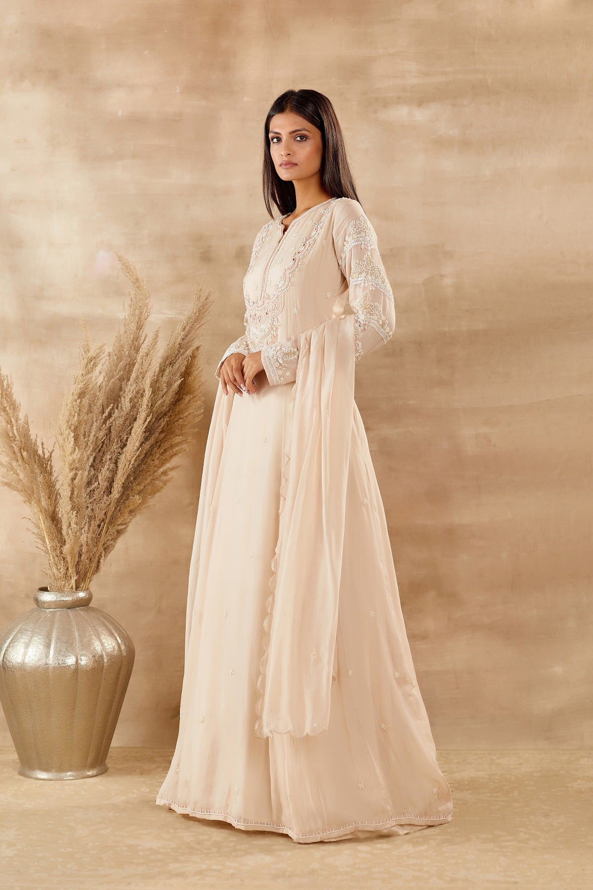 Shop stunning ivory organza Anarkali suit online in USA with dupatta. Dazzle on weddings and special occasions with exquisite Indian designer dresses, sharara suits, Anarkali suits, wedding lehengas from Pure Elegance Indian fashion store in USA.-side
