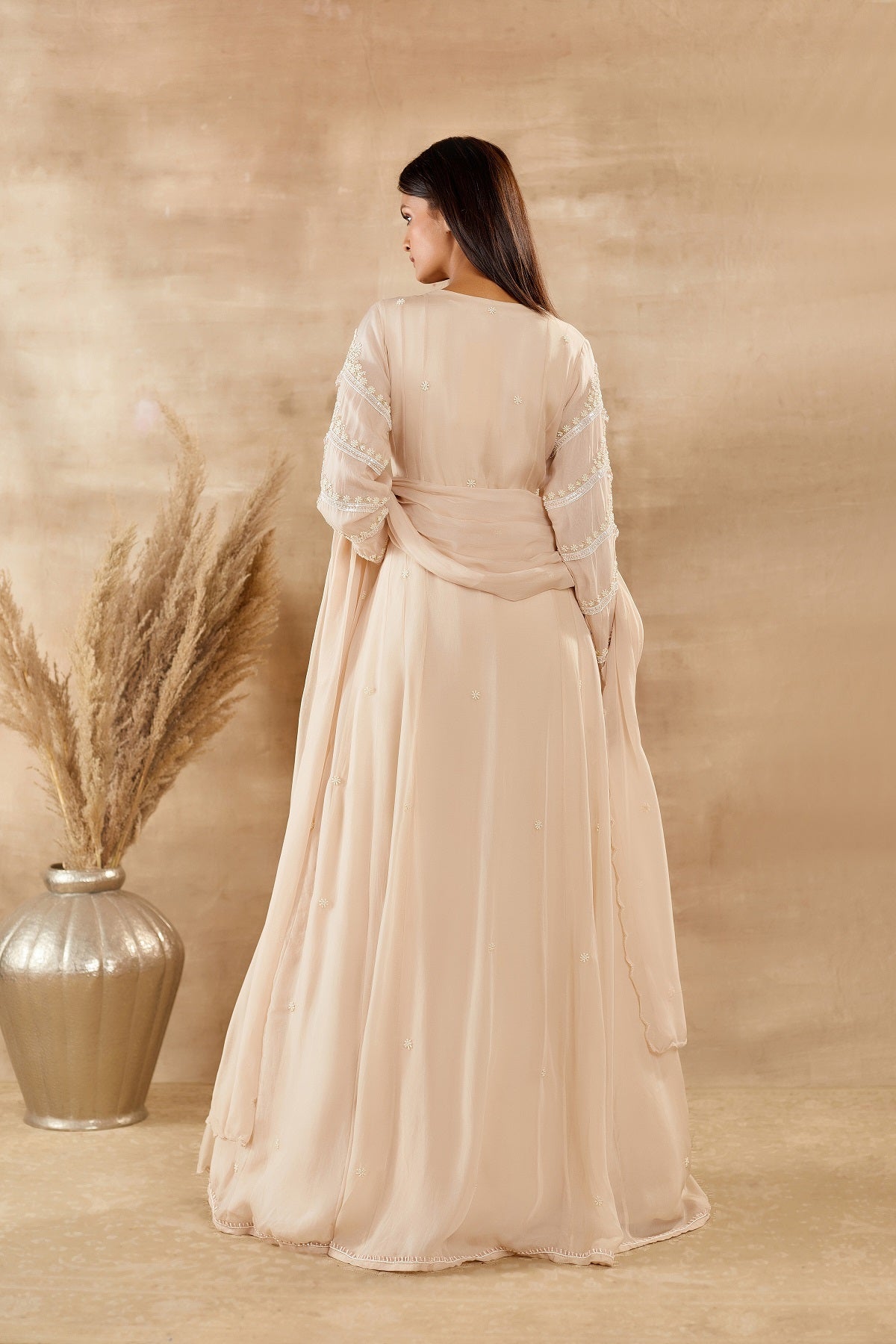 Shop stunning ivory organza Anarkali suit online in USA with dupatta. Dazzle on weddings and special occasions with exquisite Indian designer dresses, sharara suits, Anarkali suits, wedding lehengas from Pure Elegance Indian fashion store in USA.-back
