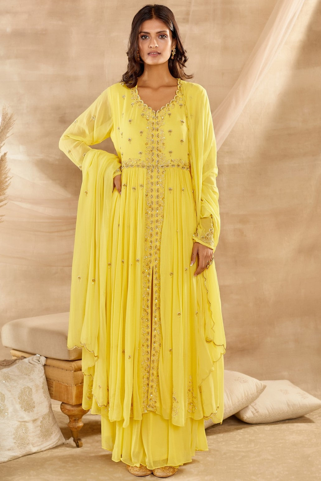 Shop beautiful yellow embroidered georgette Anarkali suit online in USA with dupatta. Dazzle on weddings and special occasions with exquisite Indian designer dresses, sharara suits, Anarkali suits, wedding lehengas from Pure Elegance Indian fashion store in USA.-front