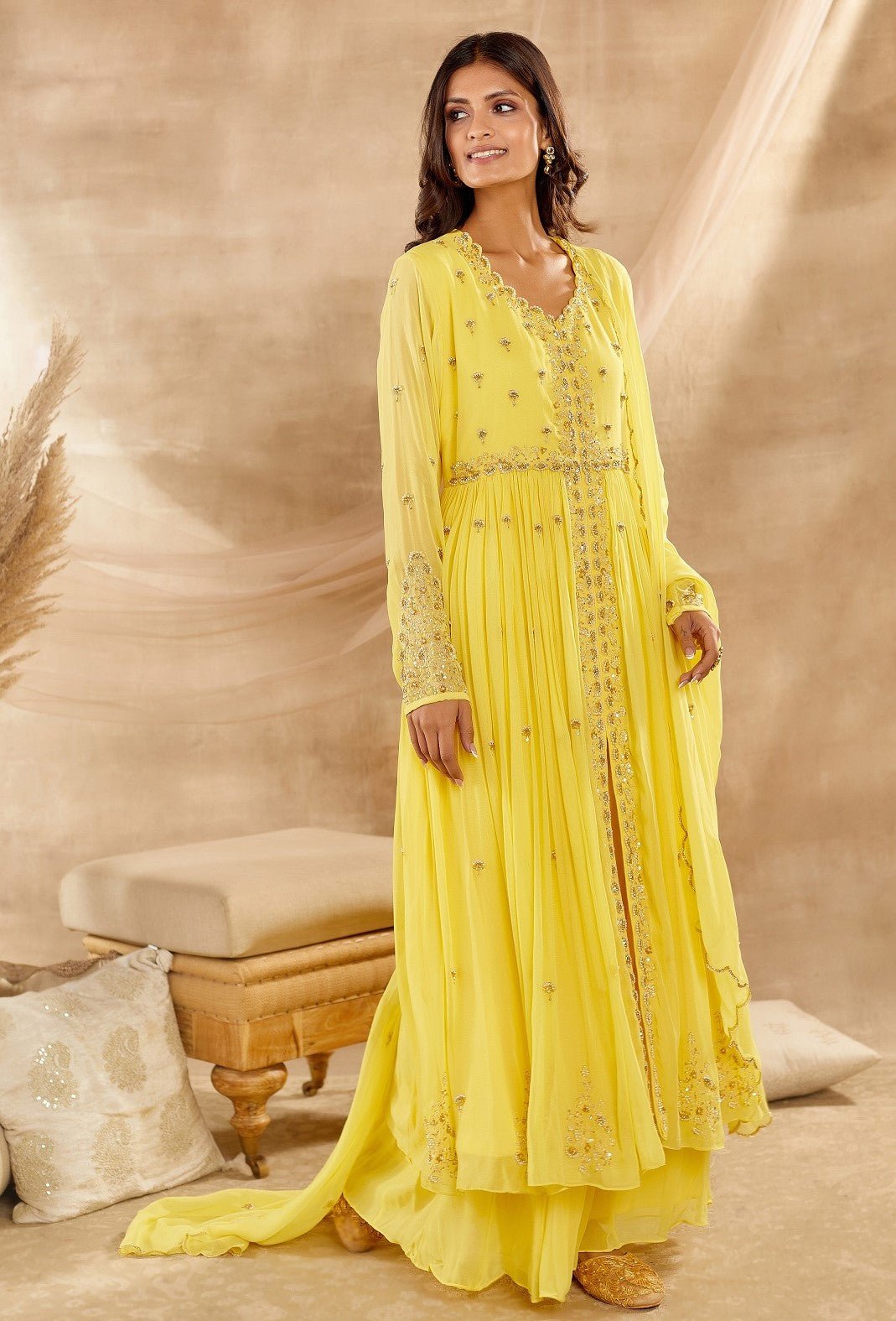 Shop beautiful yellow embroidered georgette Anarkali suit online in USA with dupatta. Dazzle on weddings and special occasions with exquisite Indian designer dresses, sharara suits, Anarkali suits, wedding lehengas from Pure Elegance Indian fashion store in USA.-full view