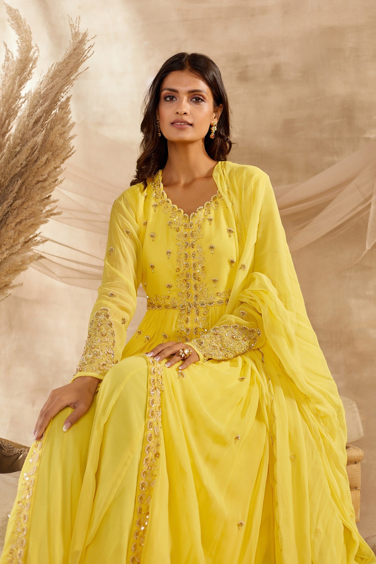 Shop beautiful yellow embroidered georgette Anarkali suit online in USA with dupatta. Dazzle on weddings and special occasions with exquisite Indian designer dresses, sharara suits, Anarkali suits, wedding lehengas from Pure Elegance Indian fashion store in USA.-closeup