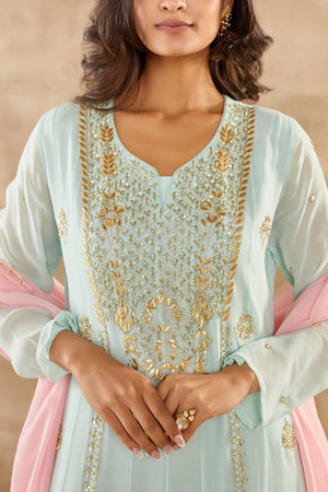 Shop stunning aqua blue embroidered georgette full sleeves Anarkali suit online in USA with dupatta. Dazzle on weddings and special occasions with exquisite Indian designer dresses, sharara suits, Anarkali suits, wedding lehengas from Pure Elegance Indian fashion store in USA.-closeup