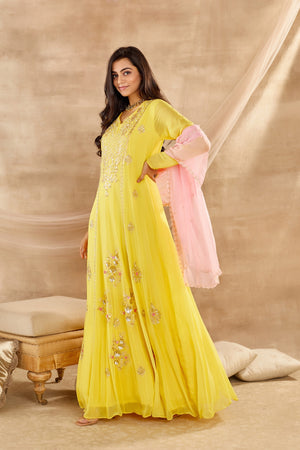 Buy beautiful mango yellow embroidered georgette full sleeves Anarkali suit online in USA with dupatta. Dazzle on weddings and special occasions with exquisite Indian designer dresses, sharara suits, Anarkali suits, wedding lehengas from Pure Elegance Indian fashion store in USA.-side