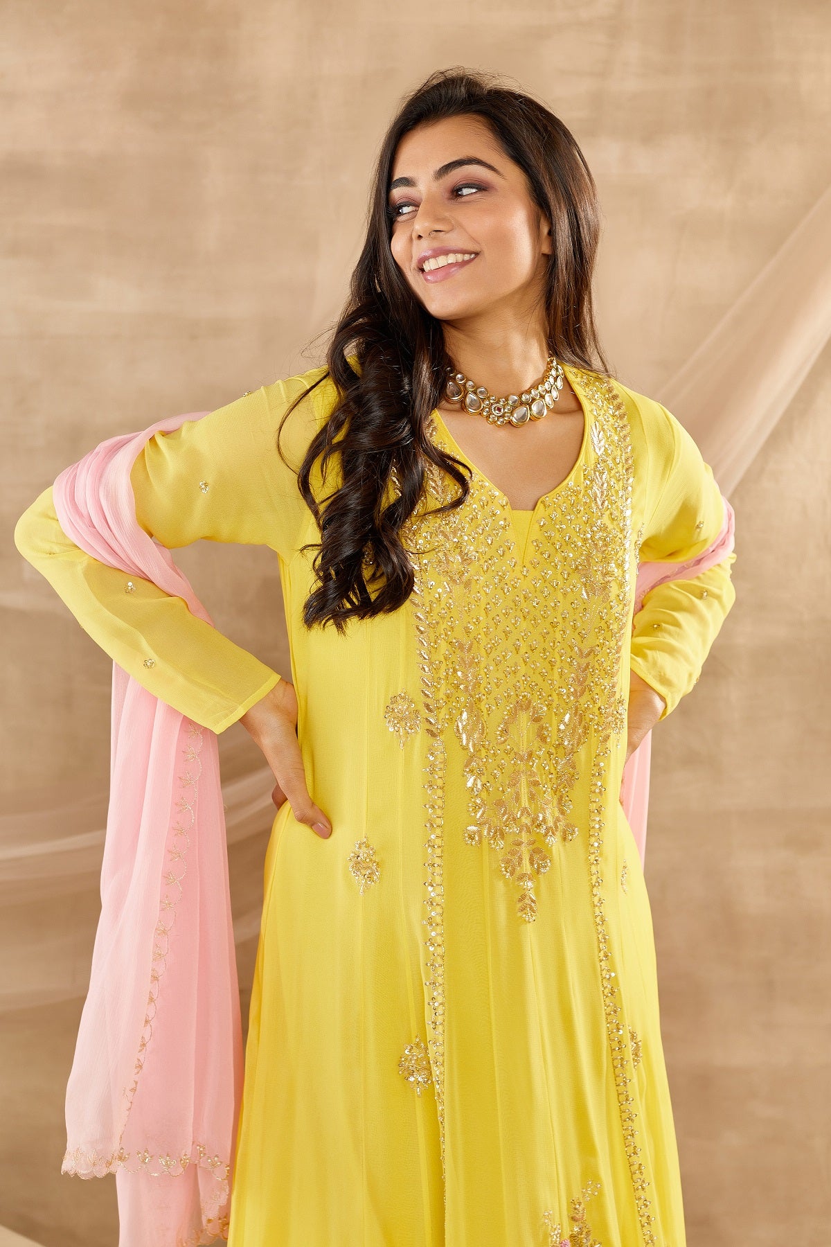 Buy beautiful mango yellow embroidered georgette full sleeves Anarkali suit online in USA with dupatta. Dazzle on weddings and special occasions with exquisite Indian designer dresses, sharara suits, Anarkali suits, wedding lehengas from Pure Elegance Indian fashion store in USA.-closeup