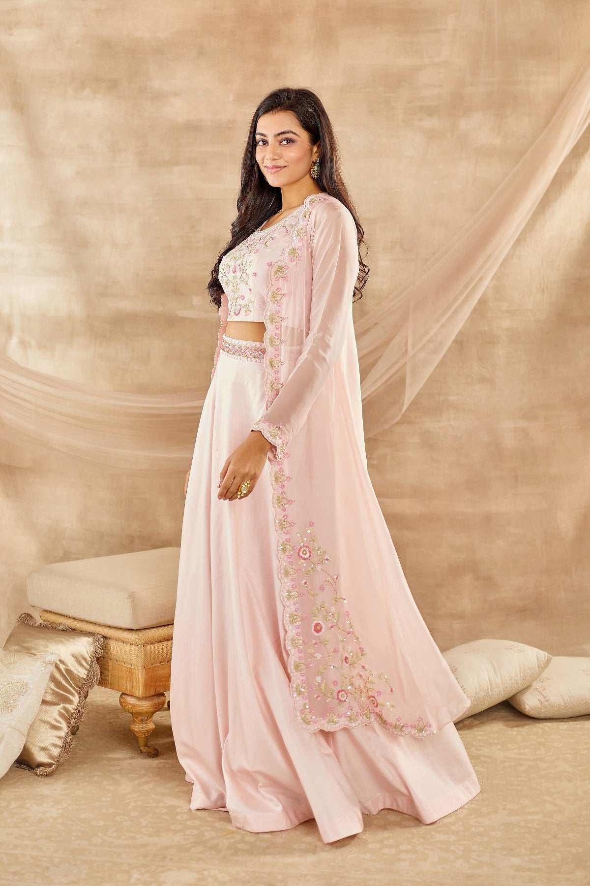 Buy powder pink embroidered organza lehenga with online in USA with dupatta. Dazzle on weddings and special occasions with exquisite Indian designer dresses, sharara suits, Anarkali suits, wedding lehengas from Pure Elegance Indian fashion store in USA.-side