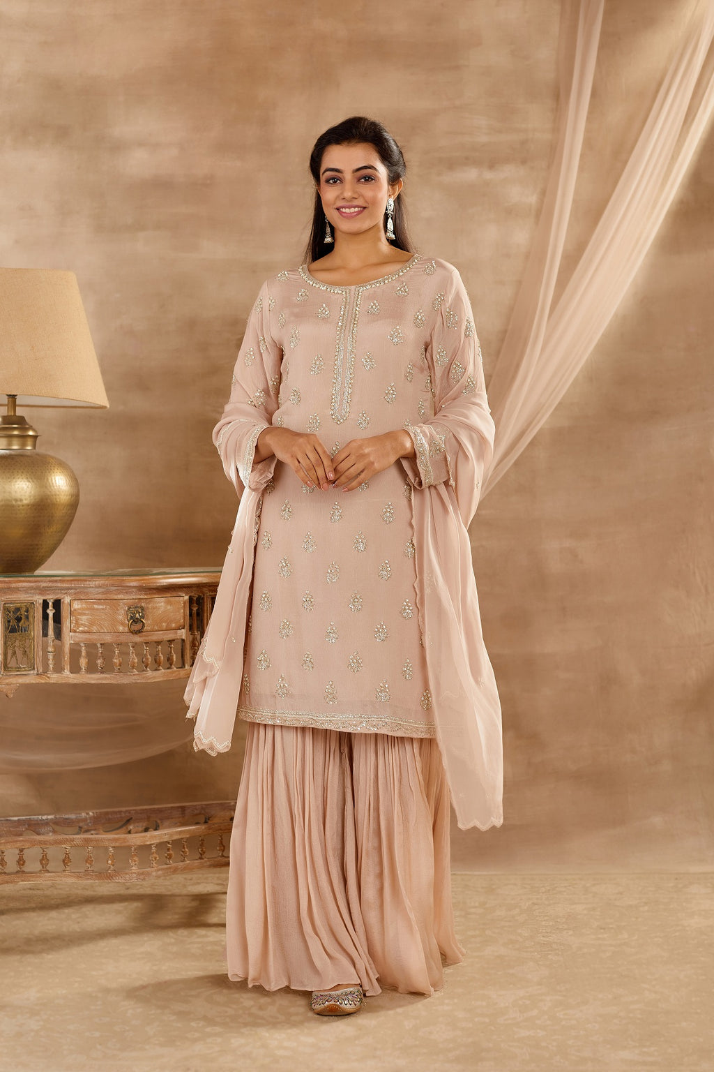 Buy sand beige embroidered georgette sharara suit with online in USA. Dazzle on weddings and special occasions with exquisite Indian designer dresses, sharara suits, Anarkali suits, wedding lehengas from Pure Elegance Indian fashion store in USA.-full view
