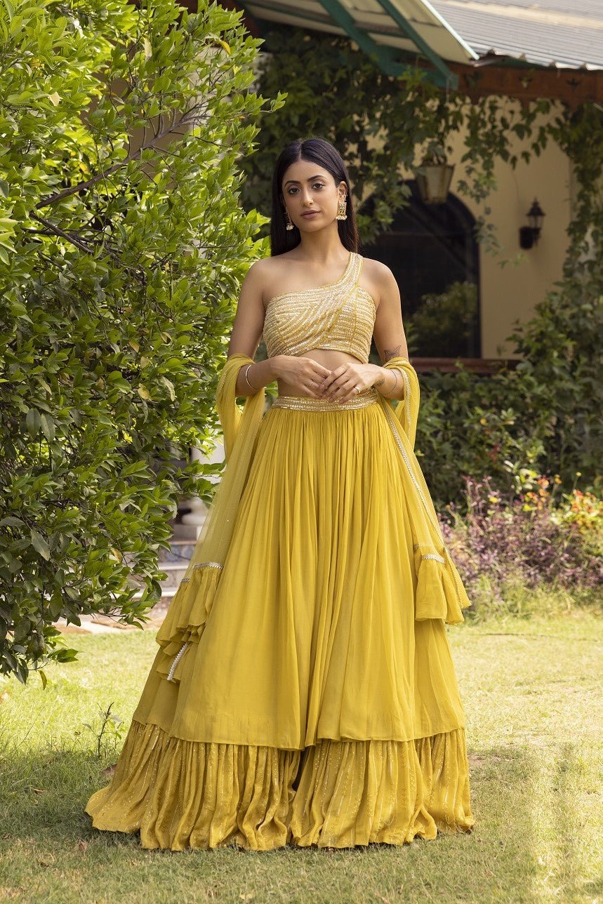 Shop beautiful pista green contemporary lehenga online in USA with cut-out blouse and dupatta. Dazzle on weddings and special occasions with exquisite Indian designer dresses, palazzo suits, Anarkali suits, wedding lehengas from Pure Elegance Indian fashion store in USA.-front