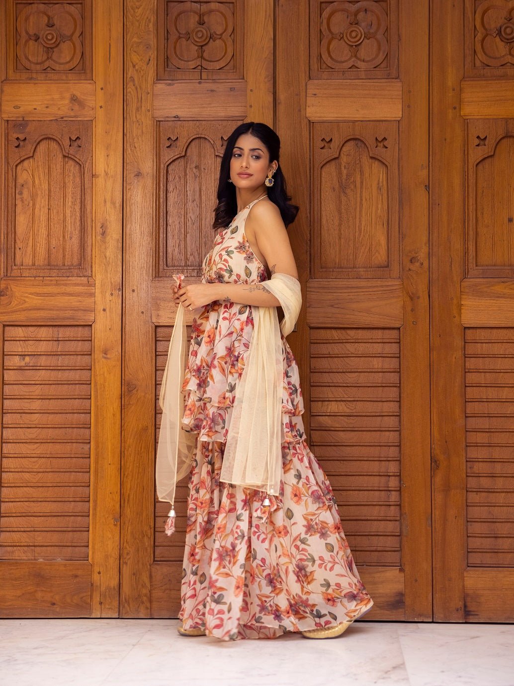 Shop stunning cream floral organza peplum sharara suit online in USA with dupatta. Dazzle on weddings and special occasions with exquisite Indian designer dresses, palazzo suits, Anarkali suits, wedding lehengas from Pure Elegance Indian fashion store in USA.-side