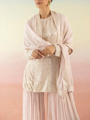 Shop beautiful powder pink sequin embellished sharara suit online in USA with dupatta. Make a fashion statement on festive occasions and weddings with designer suits, Indian dresses, Anarkali suits, palazzo suits, designer gowns, sharara suits from Pure Elegance Indian fashion store in USA.-closeup