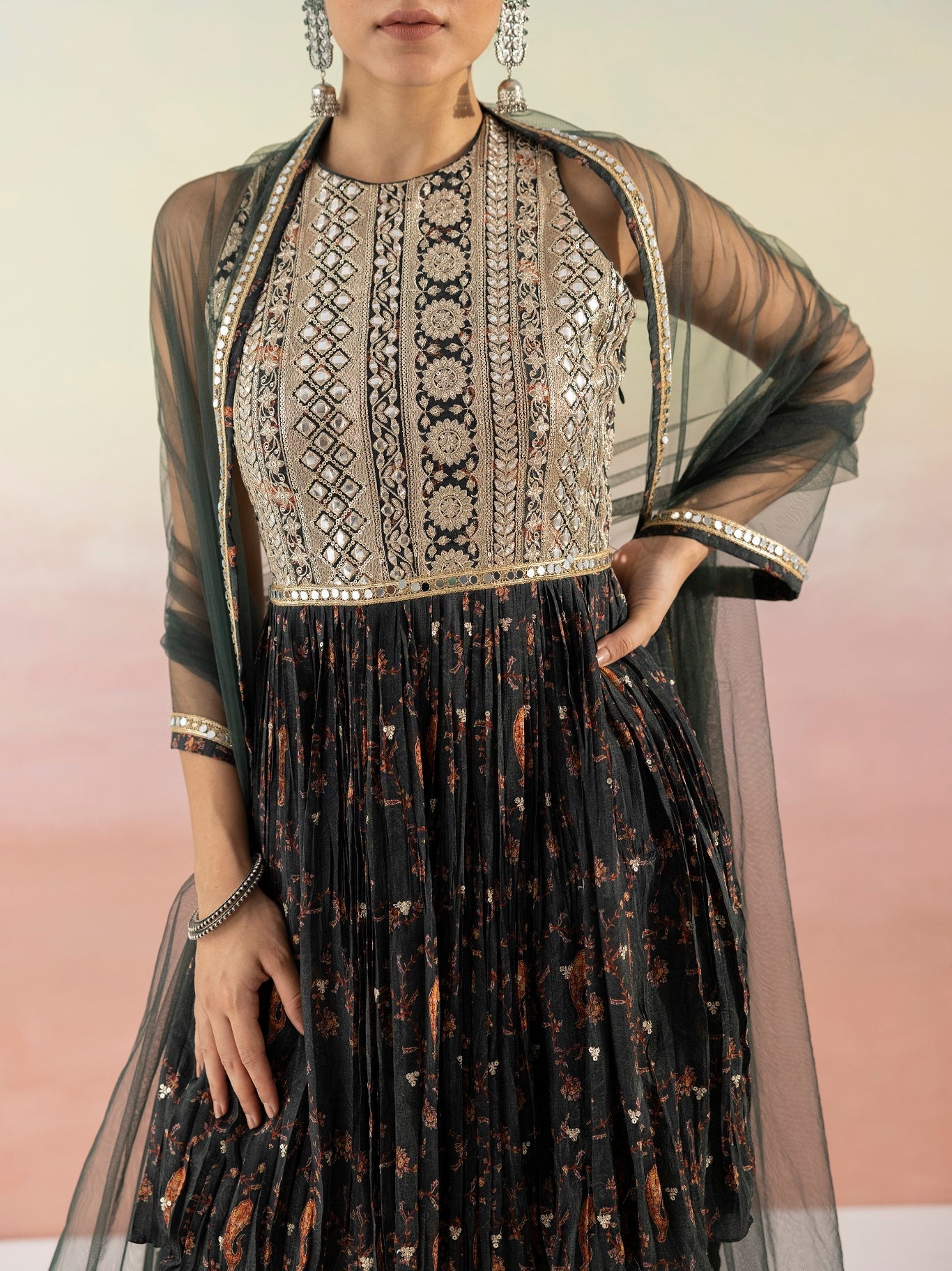 Shop black printed embroidered peplum kurta with dhoti online in USA and dupatta. Make a fashion statement on festive occasions and weddings with designer suits, Indian dresses, Anarkali suits, palazzo suits, designer gowns, sharara suits from Pure Elegance Indian fashion store in USA.-closeup