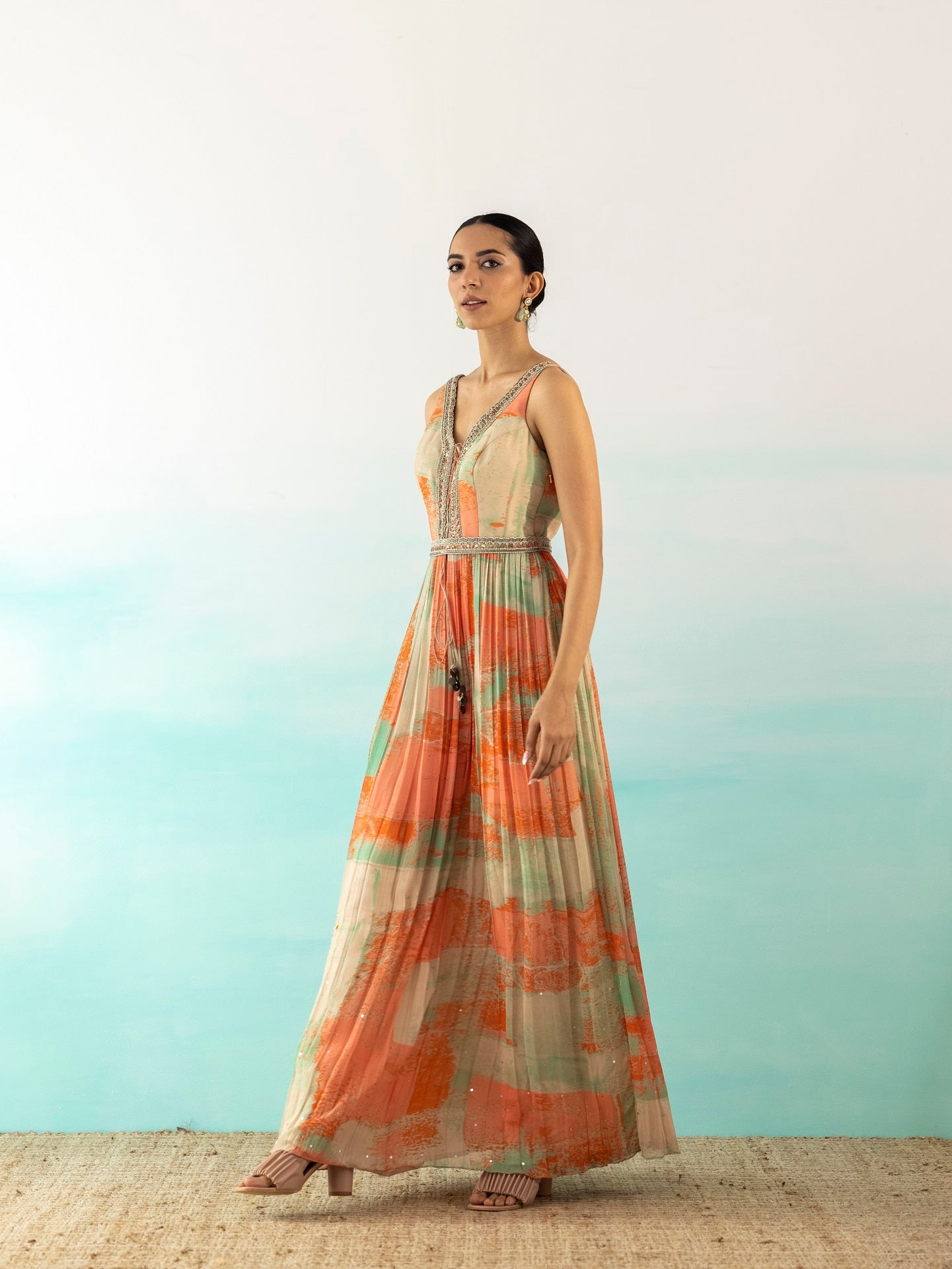 Buy stunning multicolor printed V-neck maxi dress online in USA. Make a fashion statement on festive occasions and weddings with designer suits, Indian dresses, Anarkali suits, palazzo suits, designer gowns, sharara suits from Pure Elegance Indian fashion store in USA.-side