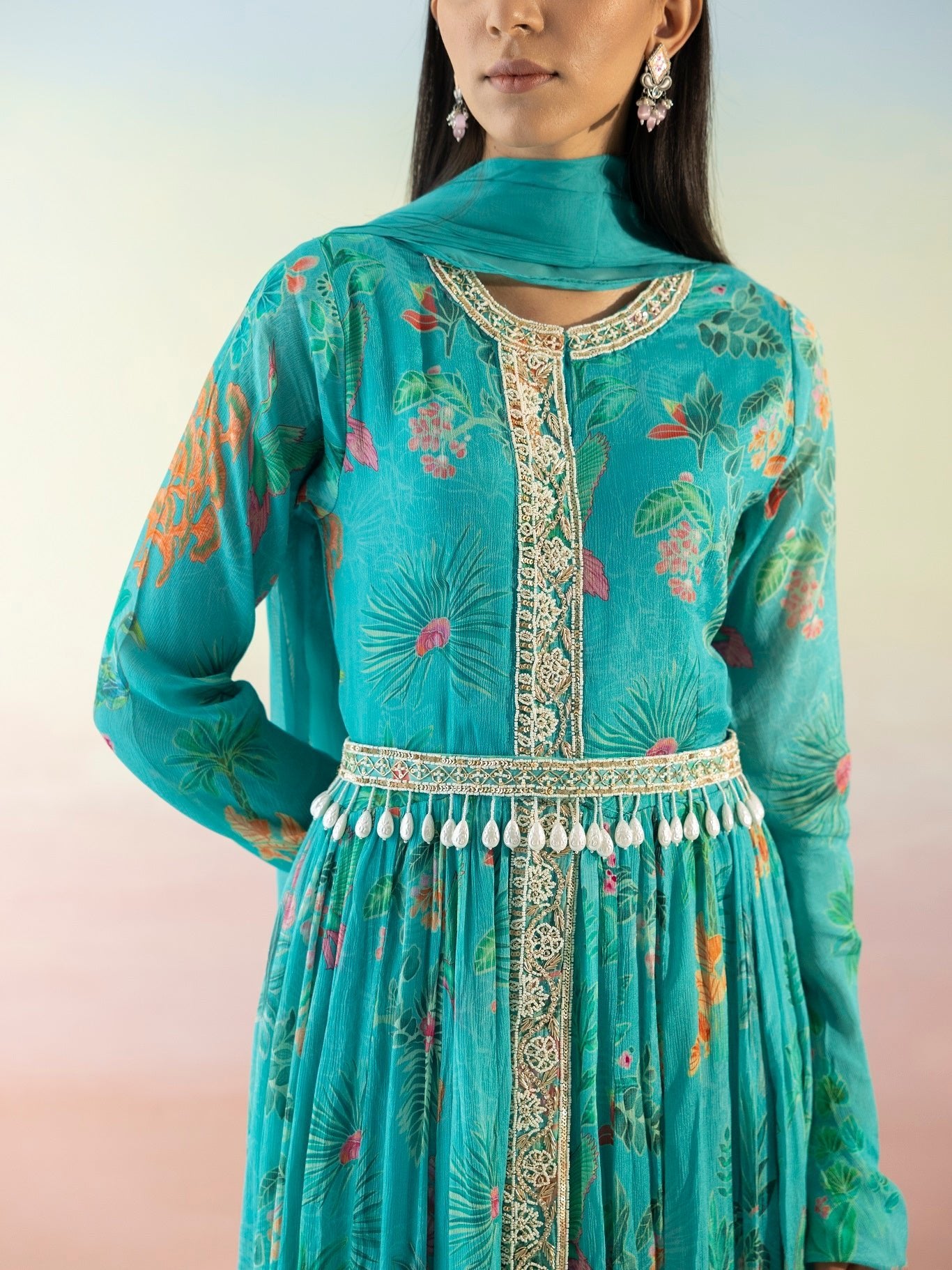 Shop beautiful turquoise blue printed georgette Anarkali online in USA with dupatta. Make a fashion statement on festive occasions and weddings with designer suits, Indian dresses, Anarkali suits, palazzo suits, designer gowns, sharara suits from Pure Elegance Indian fashion store in USA.-closeup