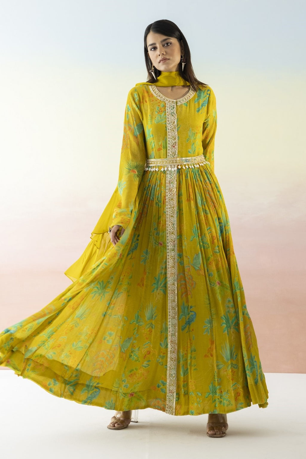 Shop yellow printed georgette Anarkali online in USA with dupatta. Make a fashion statement on festive occasions and weddings with designer suits, Indian dresses, Anarkali suits, palazzo suits, designer gowns, sharara suits from Pure Elegance Indian fashion store in USA.-full view
