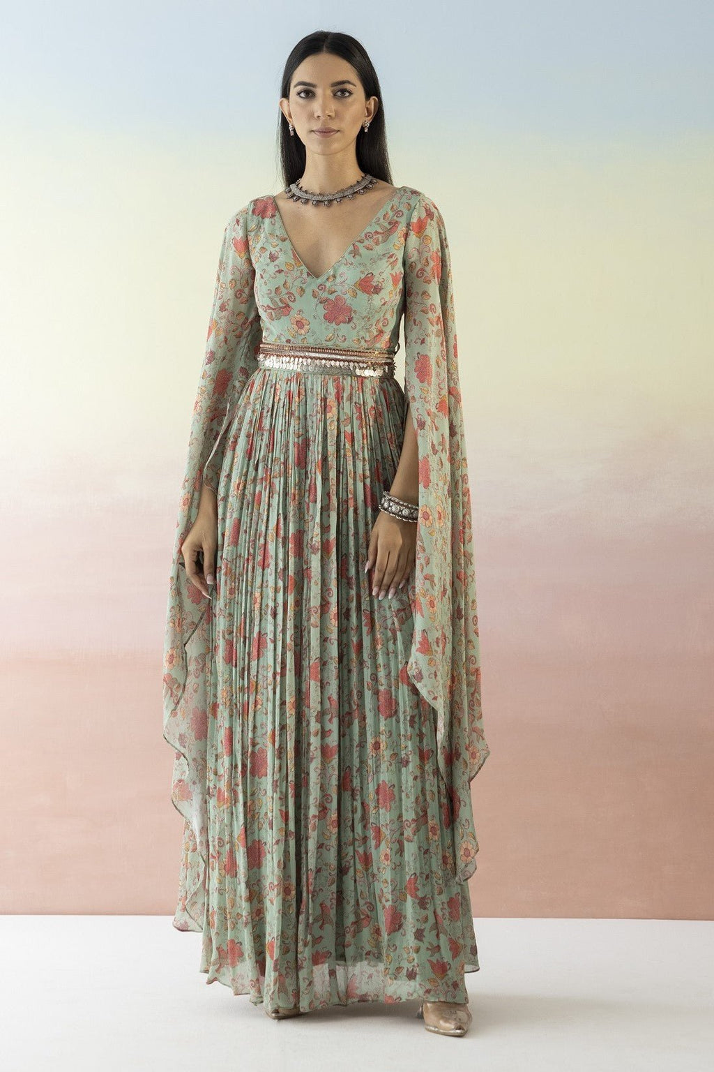 Buy beautiful green floral cape sleeves dress online in USA with embroidered belt. Make a fashion statement on festive occasions and weddings with designer suits, Indian dresses, Anarkali suits, palazzo suits, designer gowns, sharara suits from Pure Elegance Indian fashion store in USA.-full view