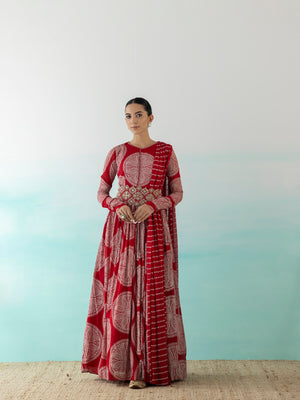 Buy stunning red printed Anarkali suit online in USA with zari dupatta. Make a fashion statement on festive occasions and weddings with designer suits, Indian dresses, Anarkali suits, palazzo suits, designer gowns, sharara suits from Pure Elegance Indian fashion store in USA.-front