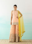 Buy beautiful soft peach georgette sharara suit online in USA with yellow dupatta. Make a fashion statement on festive occasions and weddings with designer suits, Indian dresses, Anarkali suits, palazzo suits, designer gowns, sharara suits from Pure Elegance Indian fashion store in USA.-full view