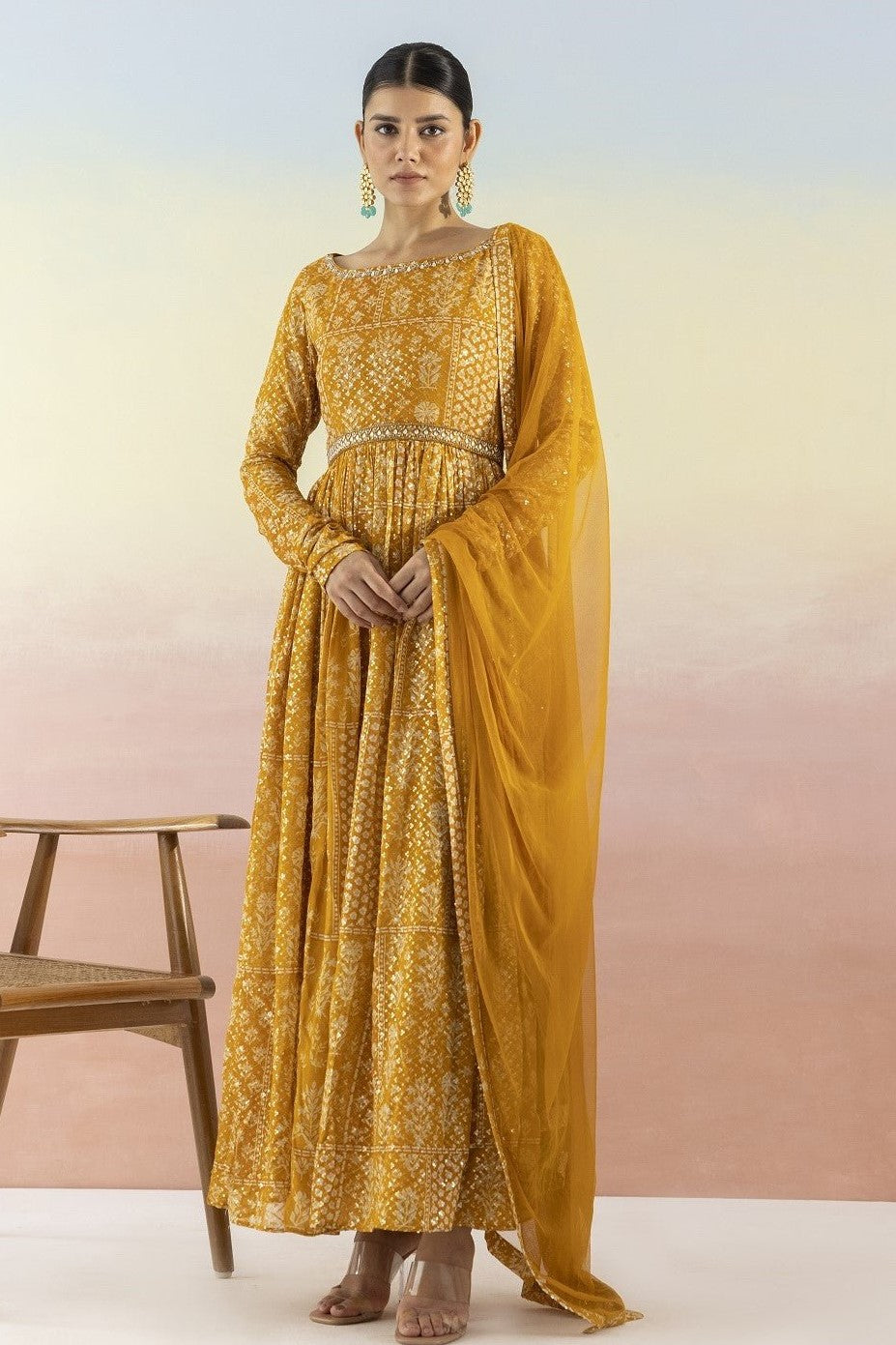 Buy beautiful mustard sequin work georgette Anarkali online in USA with dupatta. Make a fashion statement on festive occasions and weddings with designer suits, Indian dresses, Anarkali suits, palazzo suits, designer gowns, sharara suits from Pure Elegance Indian fashion store in USA.-full view