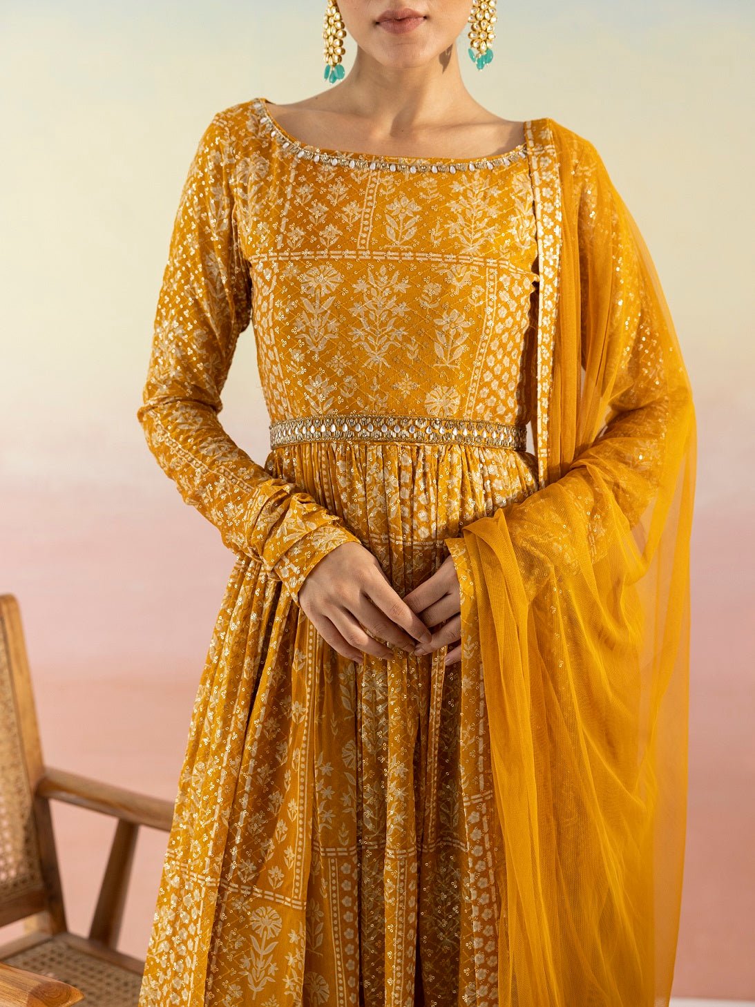 Buy beautiful mustard sequin work georgette Anarkali online in USA with dupatta. Make a fashion statement on festive occasions and weddings with designer suits, Indian dresses, Anarkali suits, palazzo suits, designer gowns, sharara suits from Pure Elegance Indian fashion store in USA.-closeup