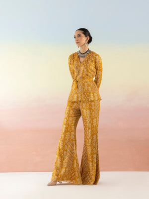 Buy beautiful mustard embellished V-neck style kurta online in USA with flared pants. Make a fashion statement on festive occasions and weddings with designer suits, Indian dresses, Anarkali suits, palazzo suits, designer gowns, sharara suits from Pure Elegance Indian fashion store in USA.-side