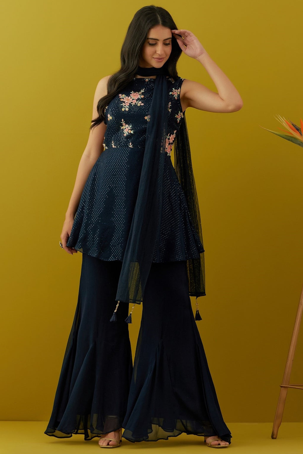 Buy beautiful navy blue embroidered peplum sharara suit online in USA with dupatta. Dazzle on weddings and special occasions with exquisite Indian designer dresses, sharara suits, Anarkali suits, bridal lehengas, sharara suits from Pure Elegance Indian clothing store in USA.-full view