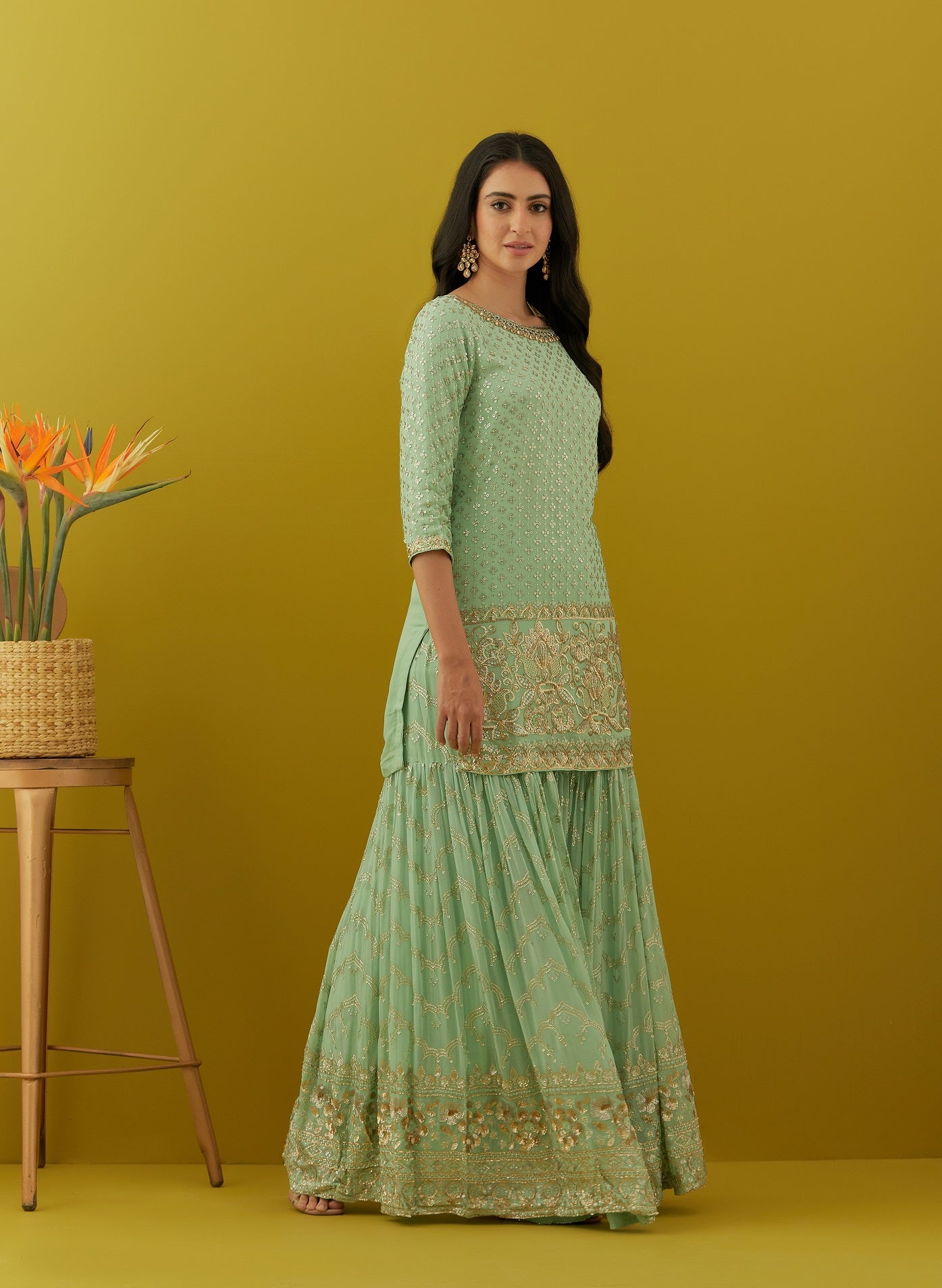 Buy beautiful aqua embroidered sharara suit online in USA with peach dupatta. Dazzle on weddings and special occasions with exquisite Indian designer dresses, sharara suits, Anarkali suits, bridal lehengas, sharara suits from Pure Elegance Indian clothing store in USA.-side