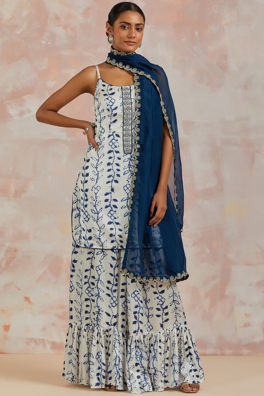 Buy white and blue modal satin printed sharara suit online in USA. Dazzle on weddings and special occasions with exquisite Indian designer dresses, sharara suits, Anarkali suits, bridal lehengas, sharara suits from Pure Elegance Indian clothing store in USA.-full view