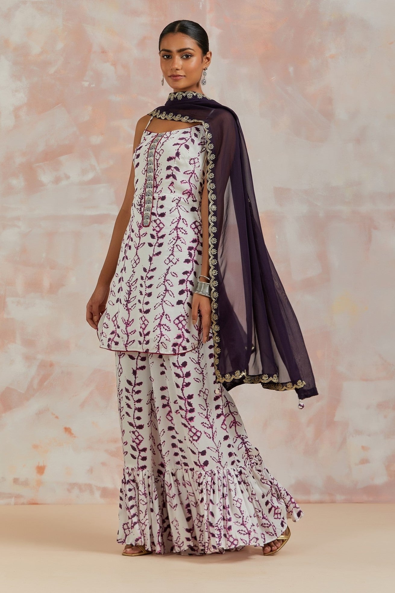 Shop beautiful white and purple modal satin printed sharara suit online in USA. Dazzle on weddings and special occasions with exquisite Indian designer dresses, sharara suits, Anarkali suits, bridal lehengas, sharara suits from Pure Elegance Indian clothing store in USA.-full view