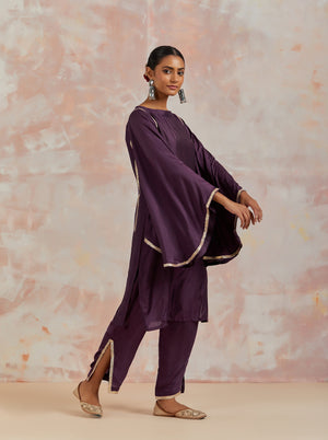 Shop beautiful purple muslin suit online in USA with gota work and butterfly sleeves. Dazzle on weddings and special occasions with exquisite Indian designer dresses, sharara suits, Anarkali suits, bridal lehengas, sharara suits from Pure Elegance Indian clothing store in USA.-sleeves