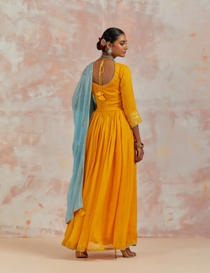Buy stunning sunflower yellow chinon Anarkali suit online in USA with blue dupatta. Dazzle on weddings and special occasions with exquisite Indian designer dresses, sharara suits, Anarkali suits, bridal lehengas, sharara suits from Pure Elegance Indian clothing store in USA.-back