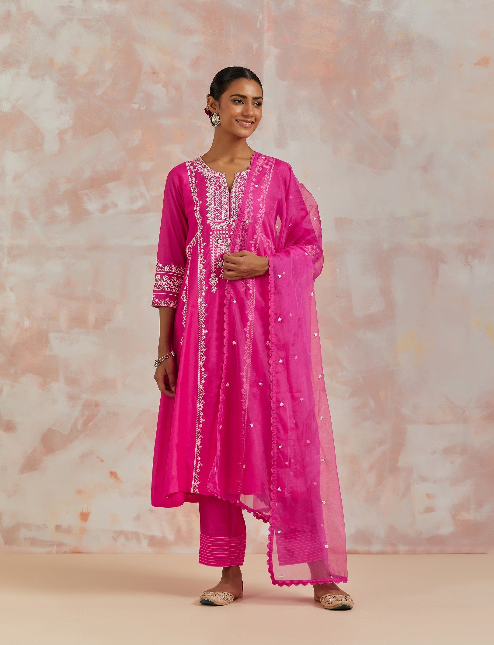 Shop beautiful rani pink chanderi cotton suit online in USA with pants and dupatta. Dazzle on weddings and special occasions with exquisite Indian designer dresses, sharara suits, Anarkali suits, bridal lehengas, sharara suits from Pure Elegance Indian clothing store in USA.-full view