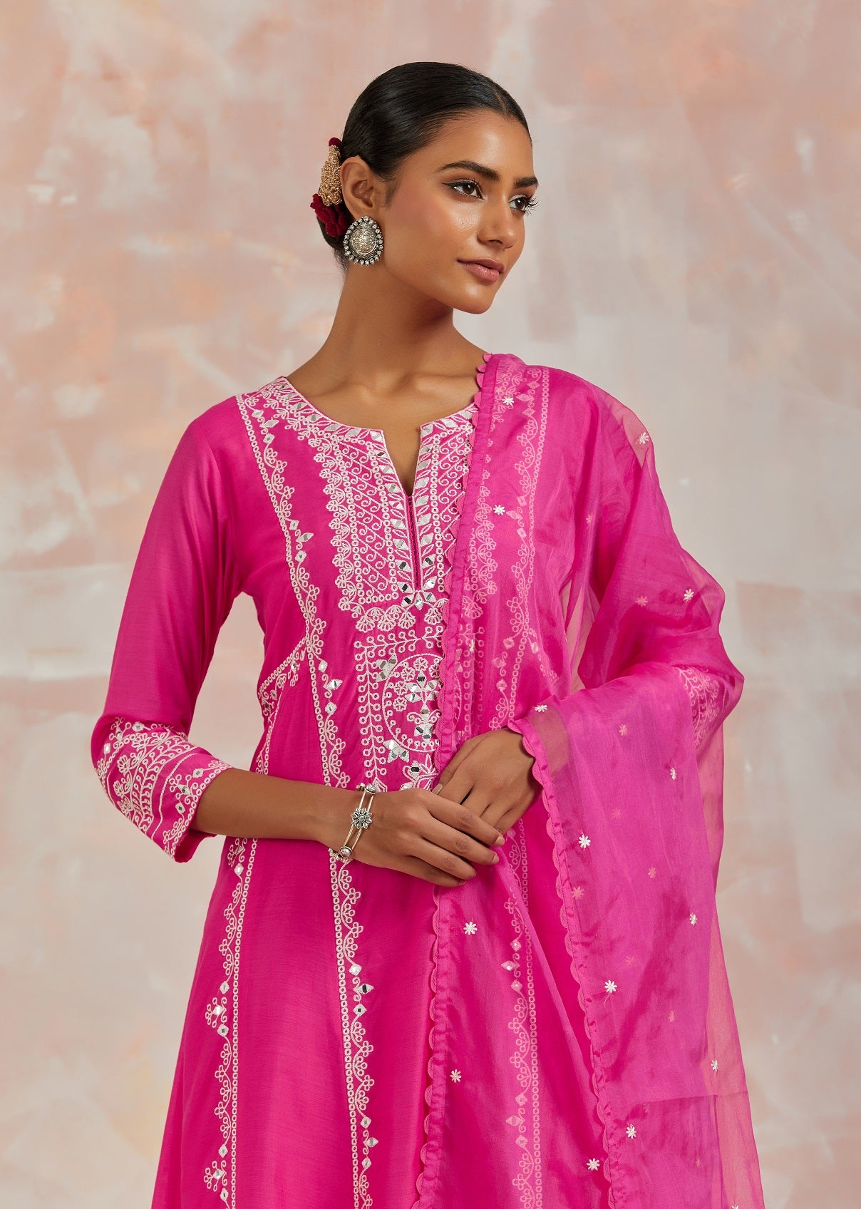Shop beautiful rani pink chanderi cotton suit online in USA with pants and dupatta. Dazzle on weddings and special occasions with exquisite Indian designer dresses, sharara suits, Anarkali suits, bridal lehengas, sharara suits from Pure Elegance Indian clothing store in USA.-closeup