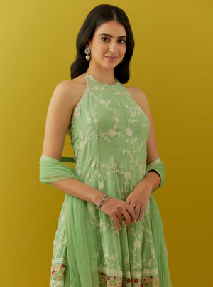 Buy mint green embroidered georgette dhoti suit online in USA with dupatta. Dazzle on weddings and special occasions with exquisite Indian designer dresses, sharara suits, Anarkali suits, bridal lehengas, sharara suits from Pure Elegance Indian clothing store in USA.-closeup